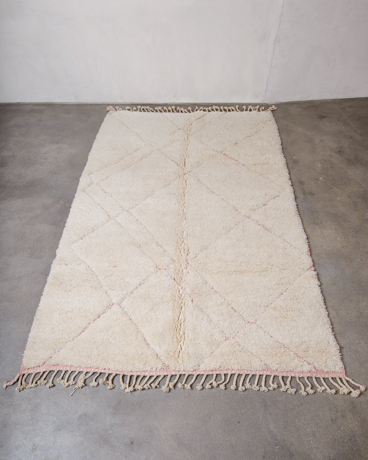Modern, designer, handcrafted Berber rug from Morocco. Beniourain carpet with beautiful colours and patterns and fluffy wool texture.